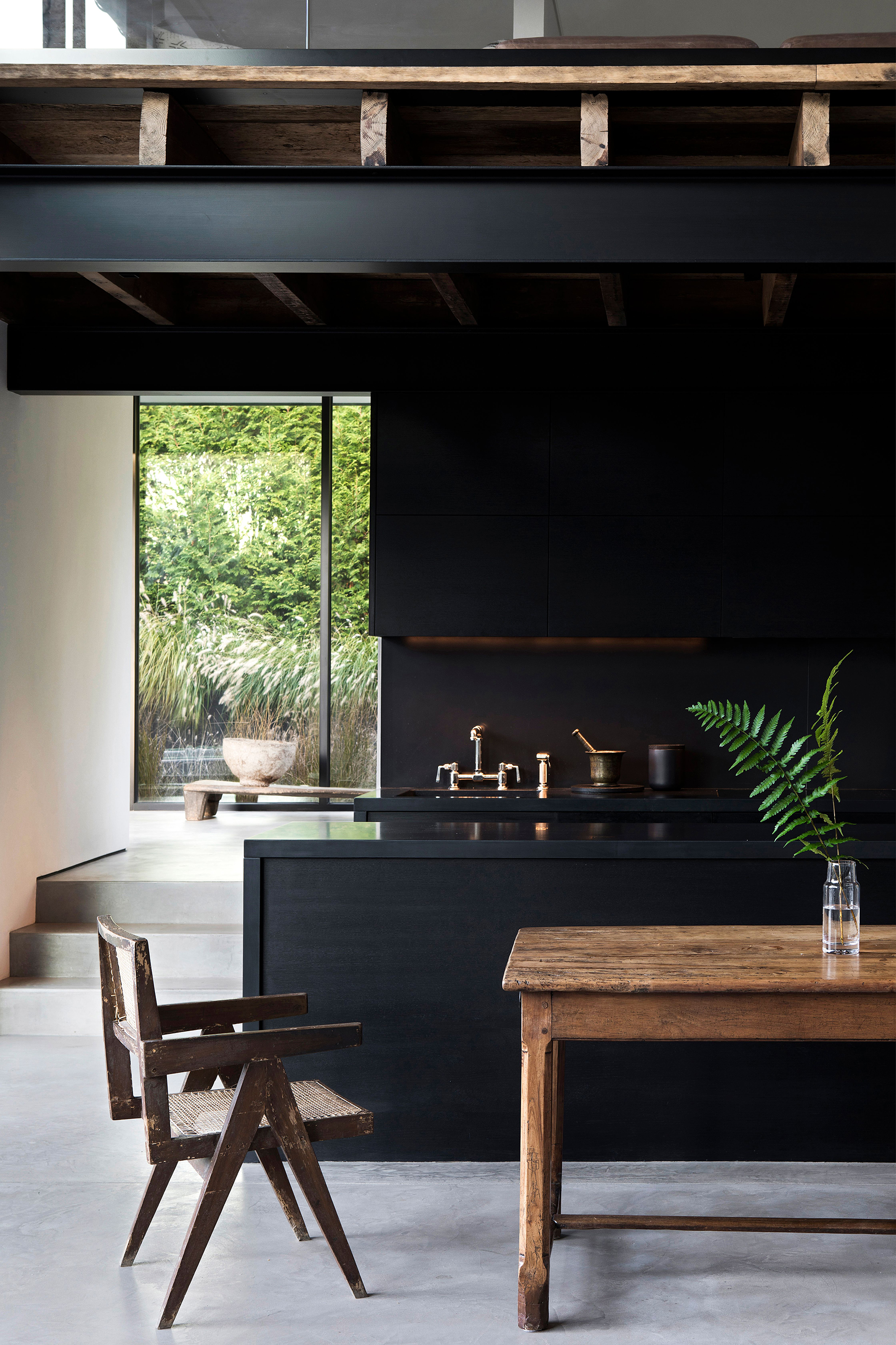 Contemporary black kitchen by Michael Del Piero