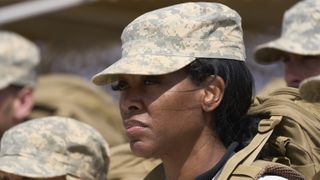 Kenya Moore with a camo hat in Special Forces: World's Toughest Test