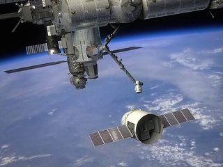 SpaceX Dragon cargo ship approaching the International Space Station in this artist's illustration.