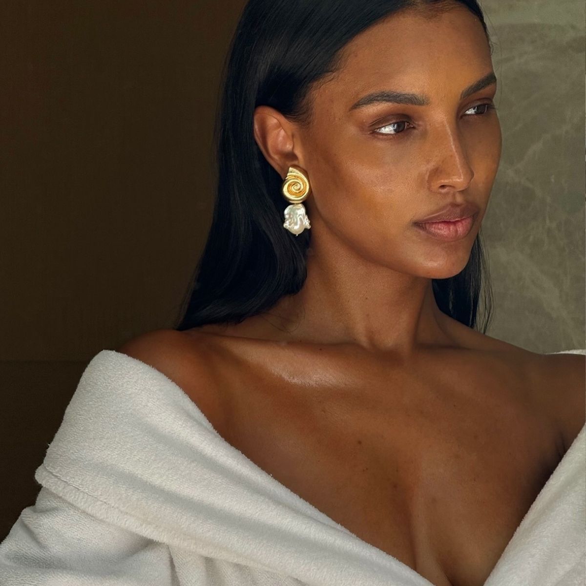 A selfie of Jasmine Tookes in a white dressing gown