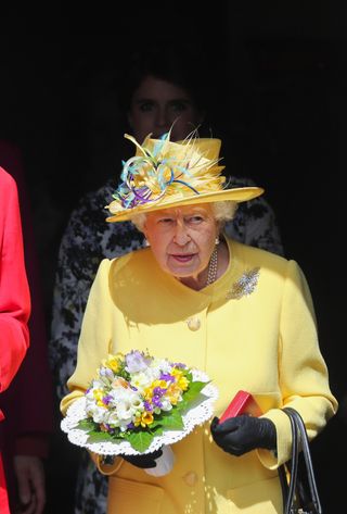 Queen Elizabeth in a colourful Easter hat for Maundy Thursday service