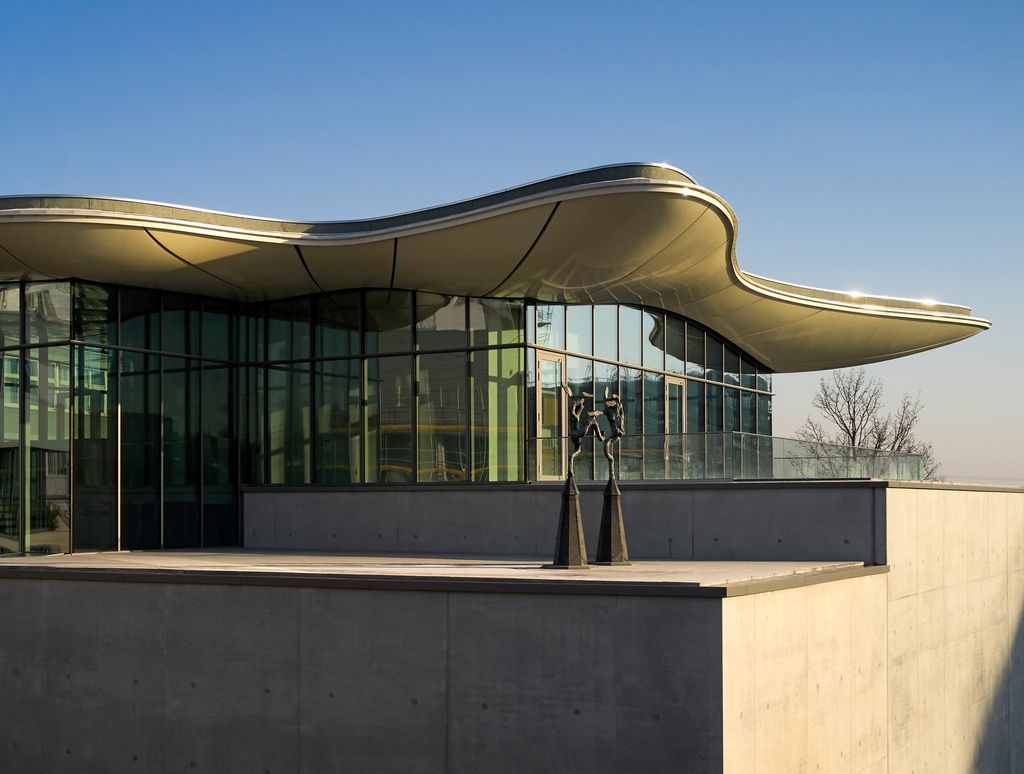 Building with wavy roof