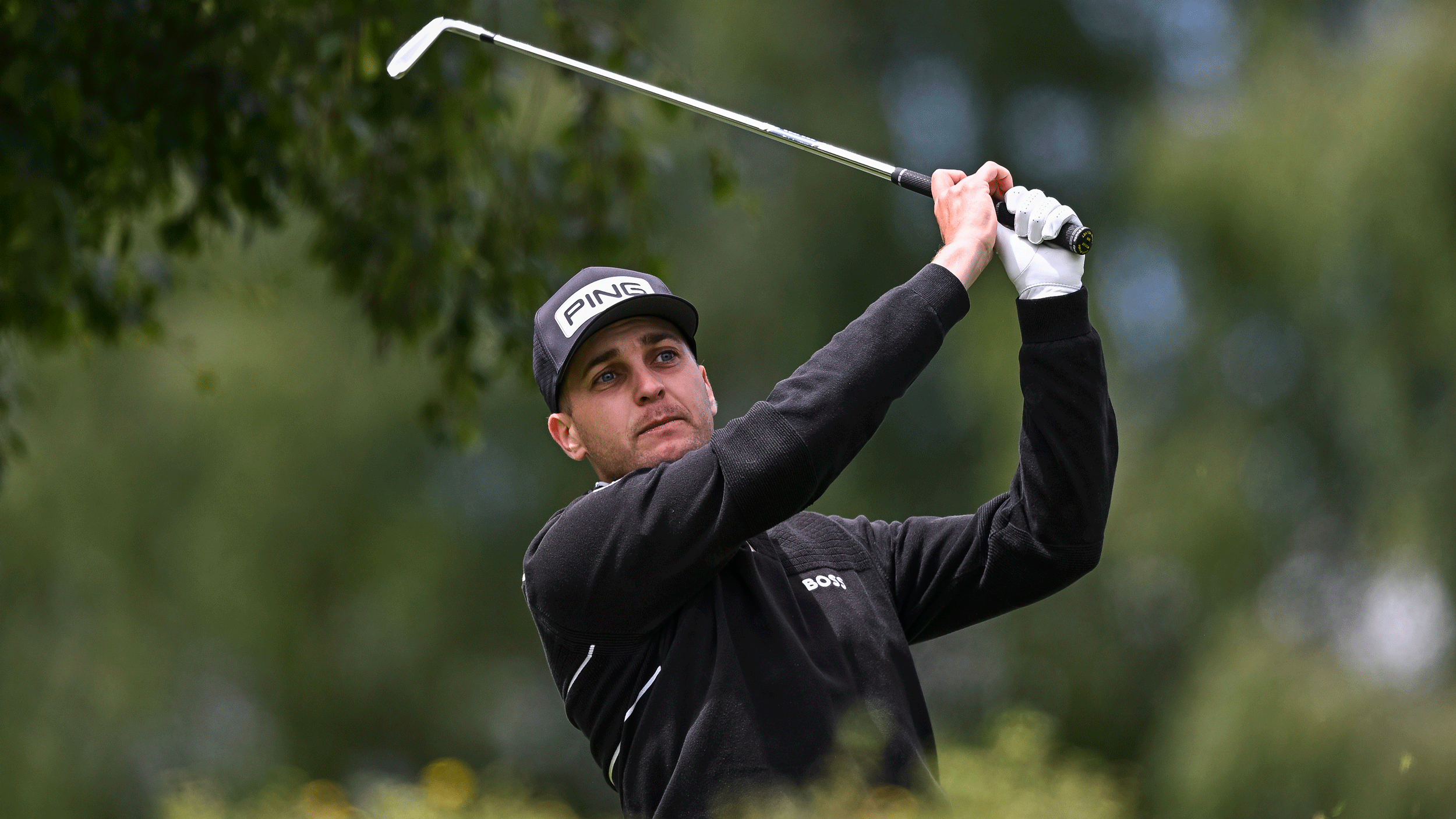 Matthias Schwab hits an iron shot at the 2026 Interwetten Open on the HotelPlanner Tour