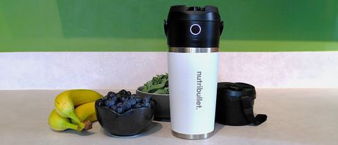 Nutribullet Flip blender on kitchen counter with fruit