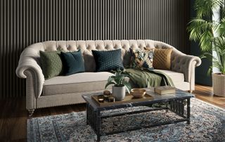 living room with black wall panelling, cream sofa, black coffee table and patterned rug