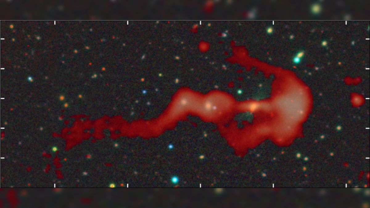 Strange glowing 'bow-and-arrow' structure may be a giant cosmic shock wave created by a supersonic galaxy collision