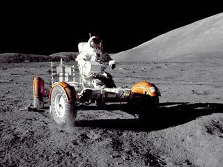 Apollo 17 mission commander Eugene A. Cernan makes a short checkout of the Lunar Roving Vehicle during the early part of the first Apollo 17 extravehicular activity at the Taurus-Littrow landing site in 1972.