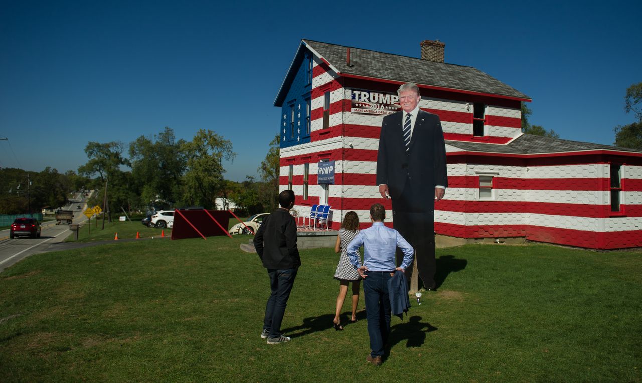 Trump supporters gather at a Trump-decorated house in Youngstown, Pennsylvania.