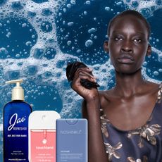 a woman on a bubble background with three bottles of hand sanitizer