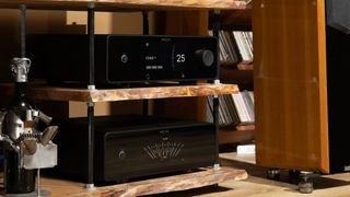 Rotel Michi Prestige P430 and S430 stereo amp and preamp on a rack