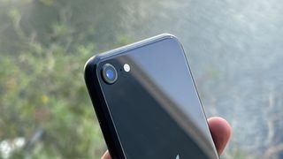 A close-up of the camera on an iPhone SE 2022