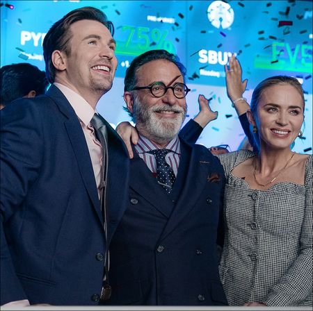 Chris Evans as Brenner, Andy Garcia as Neel and Emily Blunt as Liza in Pain Hustlers.