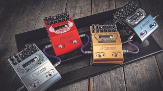 Two Notes pedals including the Le Lead on a pedalboard on a wooden floor