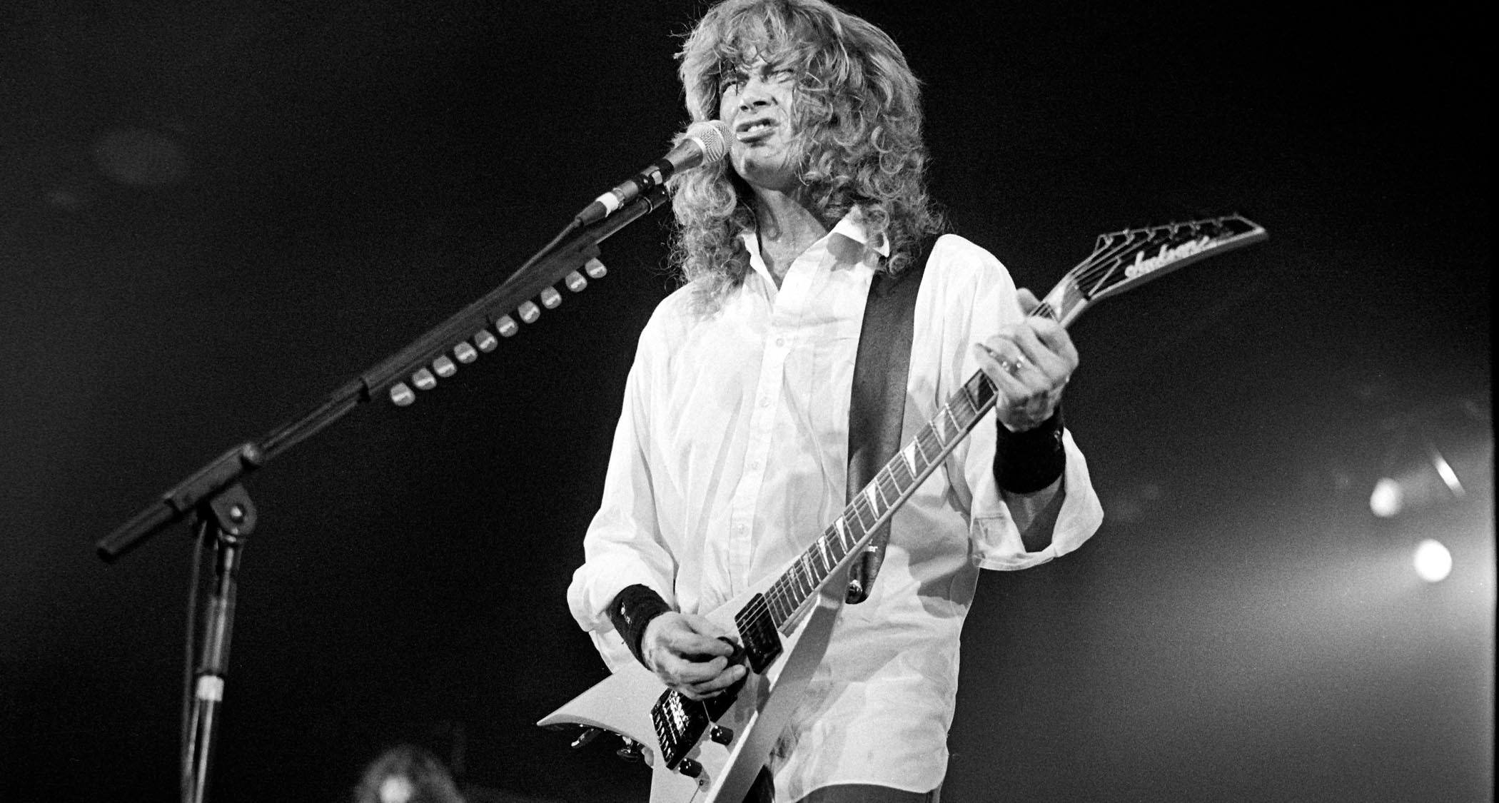 Dave Mustaine plays a silver Jackson King V live onstage in Belgium, 1995.