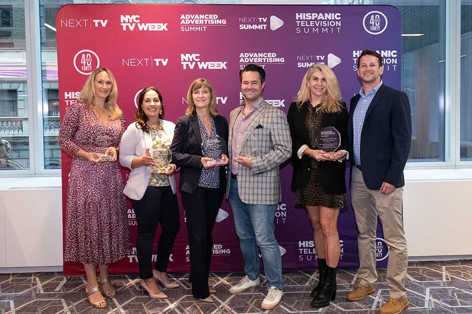 Accepting the Advanced Advertising Innovation Awards (l. to r.): Kristin Wnuk, Roku; Trish Mielke, Hershey; Beth Plummer, Spectrum Reach; Scott Swanson, iSpot.TV; Abbey Thomas, OpenAP; and Bennett Strauss, Mediacom. 