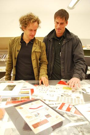 Yves Behar and Bret Recor of Fuseproject peruse vintage advertising at Herman Miller’s extensive archive building in Michigan