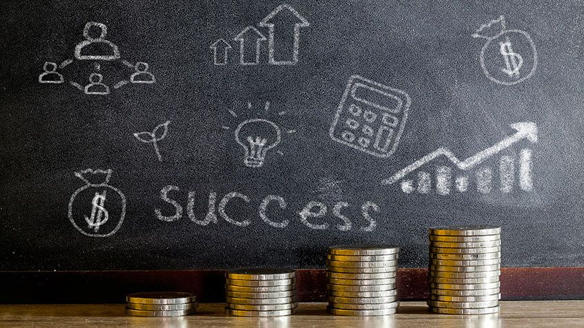 Coins and a blackboard