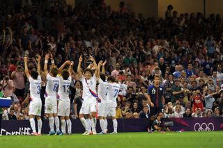 South Korea players celebrate their second goal in the bronze medal match at the 2012 Olympics.