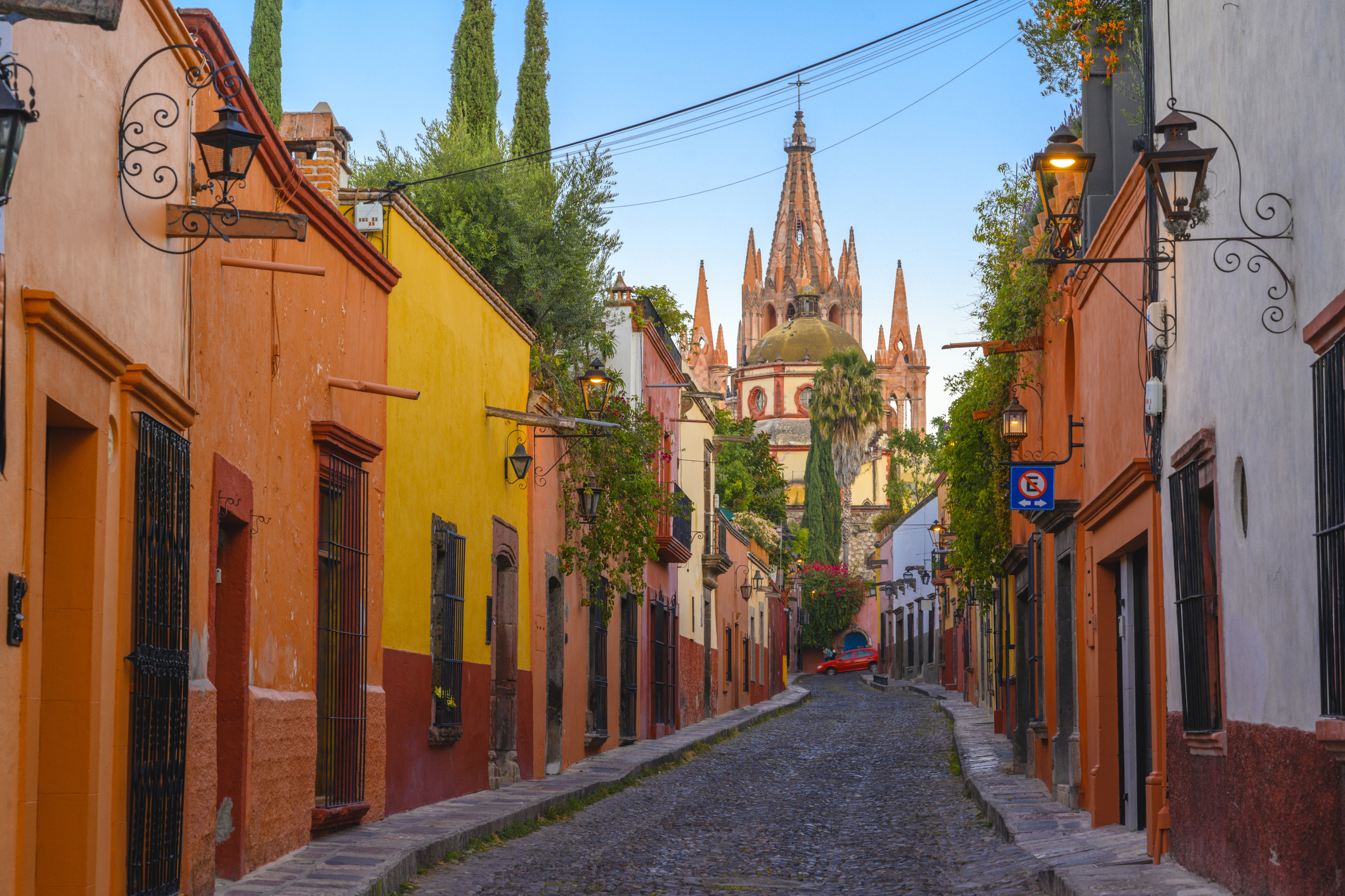 City street leading to a parish church in San Miguel de Allende, Mexico