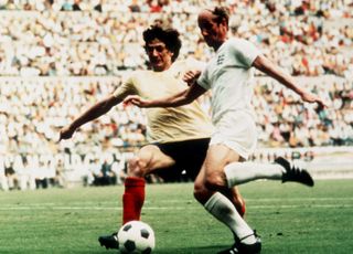 Bobby Charlton (right) in action for England against Romania at the 1970 World Cup.