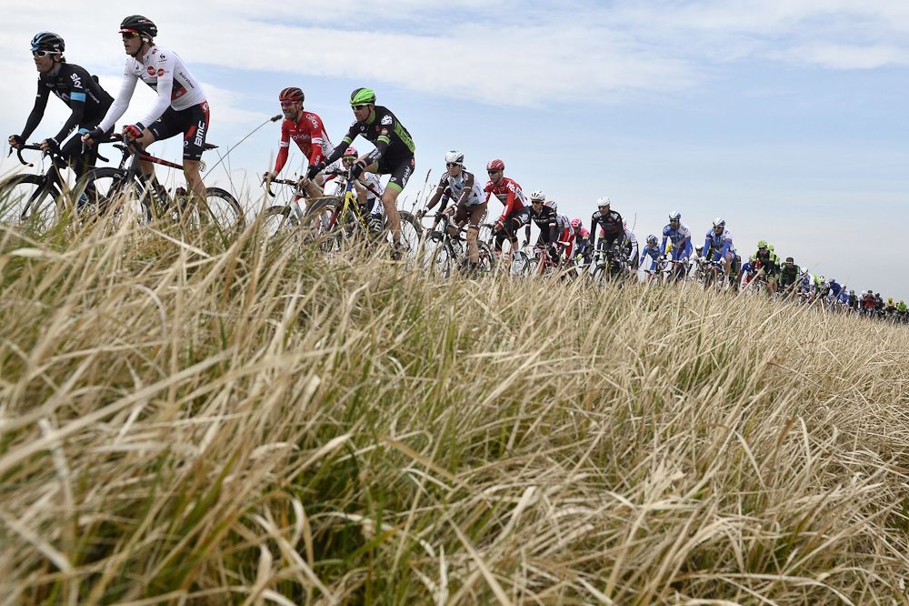 The pack rides during the second stage of the 73rd edition of the Paris-Nice.