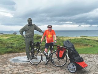 Nic Armitage with Arnold Palmer statue