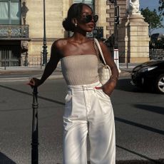 @aidabadji_ wears tailored trousers from Zara