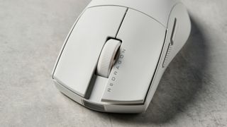 Photograph of Redragon M916 Pro mouse in white