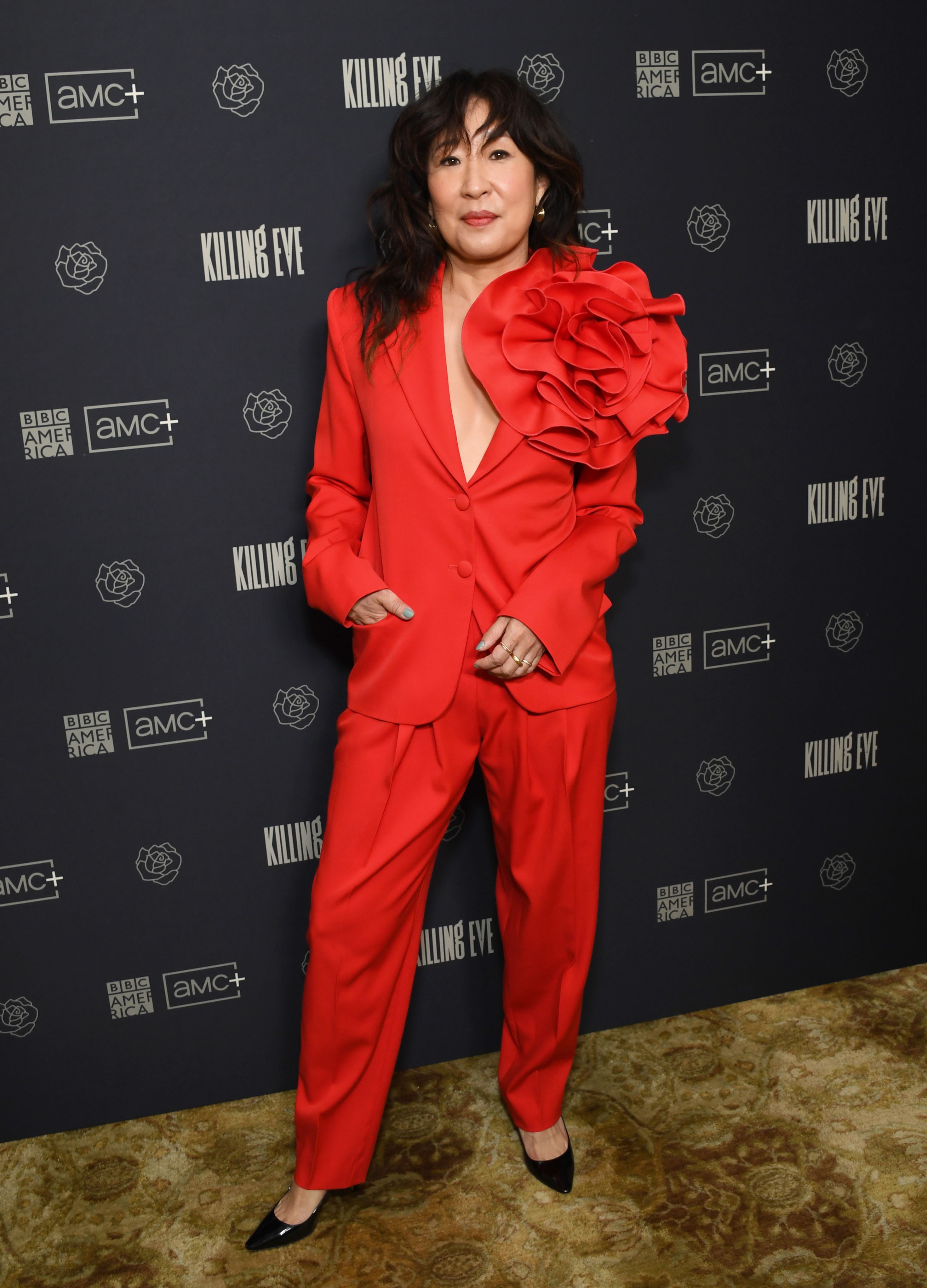Sandra Oh wearing red