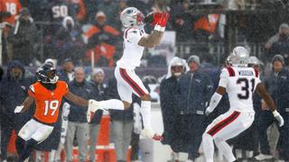 Christian Gonzalez of the New England Patriots intercepts a pass from Jarrett Stidham of the Denver Broncos during January’s AFC Championship Game.