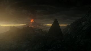 Sauron looks out onto Mordor and Mount Doom from a mountain top in The Rings of Power episode 8