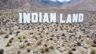 A Desert X art installation titled "Indian Land."