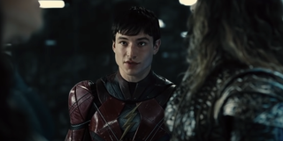 Ezra Miller as the Flash talking to Jason Momoa's Aquaman in Justice League