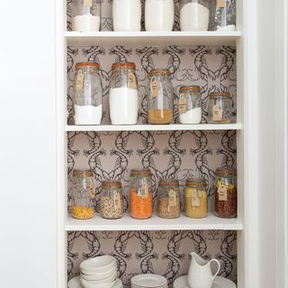 Open shelves with wallpaper on the back