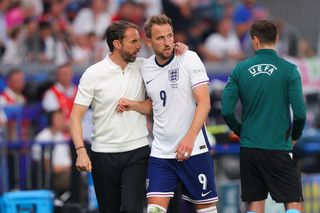 Harry Kane speaks to Gareth Southgate during England's 1-1 draw against Denmark at Euro 2024.