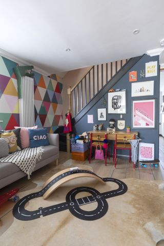 Children's playroom with colourful walls and toys