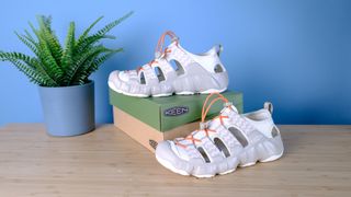 the keen hyperport h2 water hiking sandals with aquagrip soles, injected foam soles, and a cinch clasp for slip-on ease, in the taupe/coral colorway