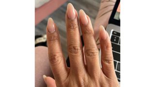 A close-up of Digital Beauty Editor, Aleesha Badkar's neutral almond nails