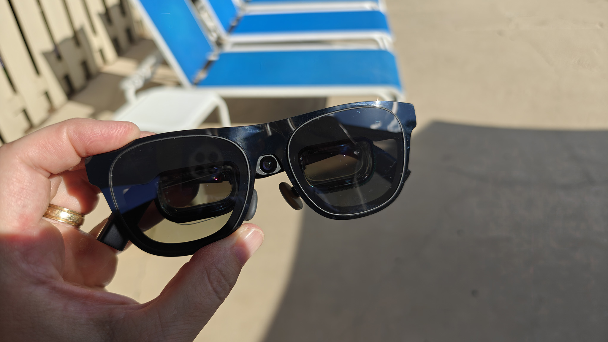 Xreal One Pro smart glasses with an Xreal Eye camera attached