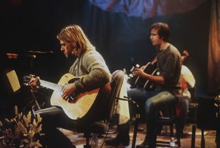 Kurt Cobain (left) and Krist Novoselic perform onstage with Nirvana at Sony Studios in New York City on November 18, 1993