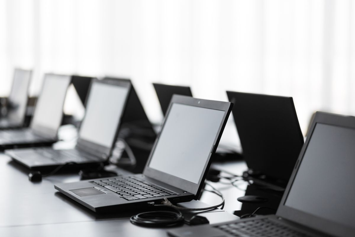 Two rows of laptops