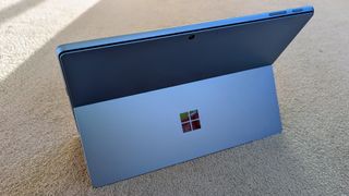 Microsoft Surface Pro 9 review: kickstand open on blue tablet