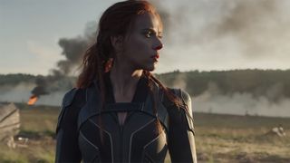 Black Widow surveys a wreckage site in her solo Marvel movie