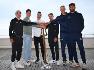 Pidcock, Van der Poel, Ayuso, Hindley, Milan and Ganna all pose with the Tirreno-Adriatico trophy before the 2025 race began