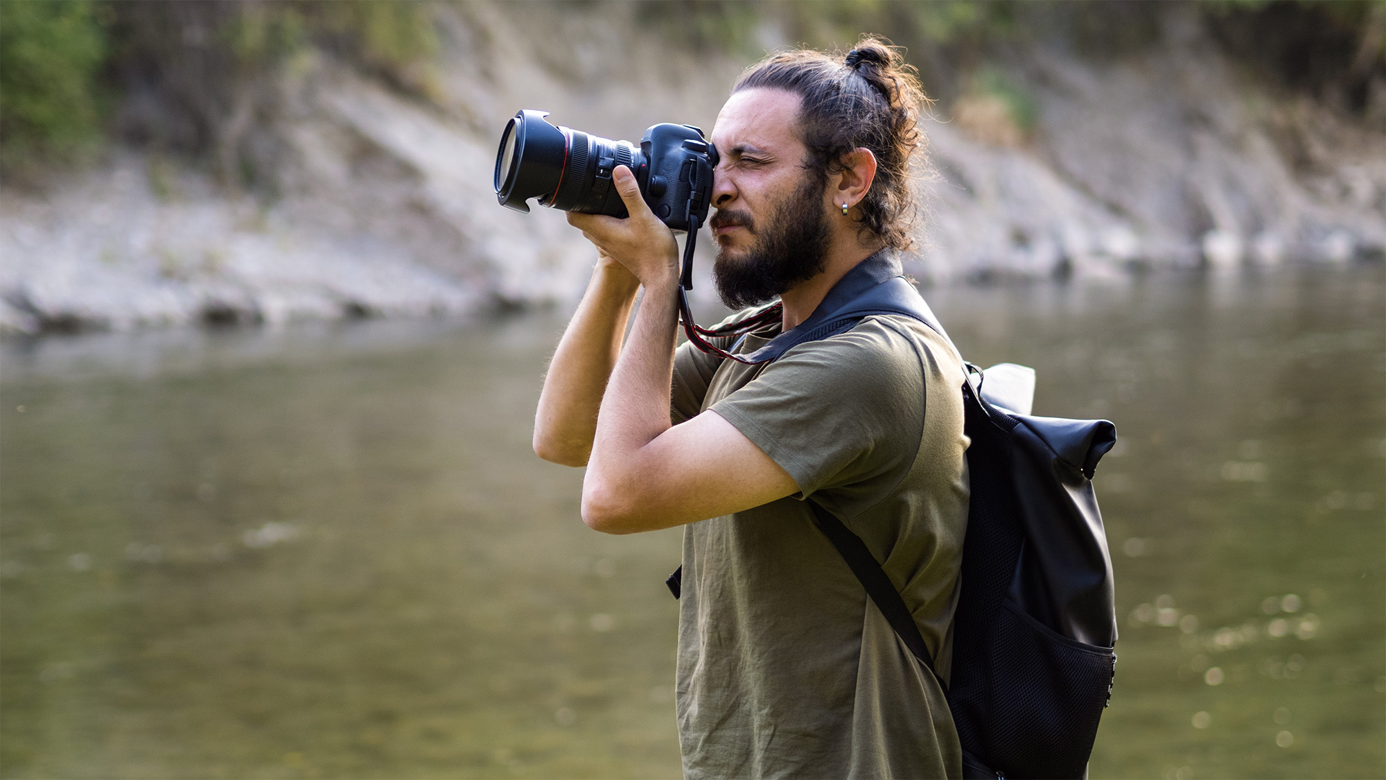 Photographer holding camera 