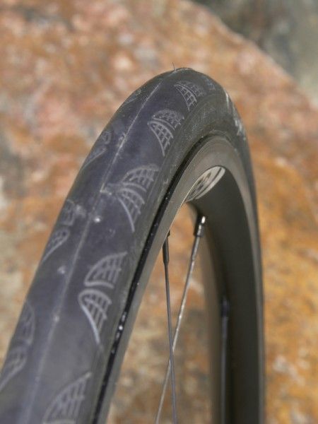 The C2 rim lets typical 23mm-wide tires spread out a little more for a bigger contact patch and better sidewall support. HED also claims the resultant shape is more aero, too.