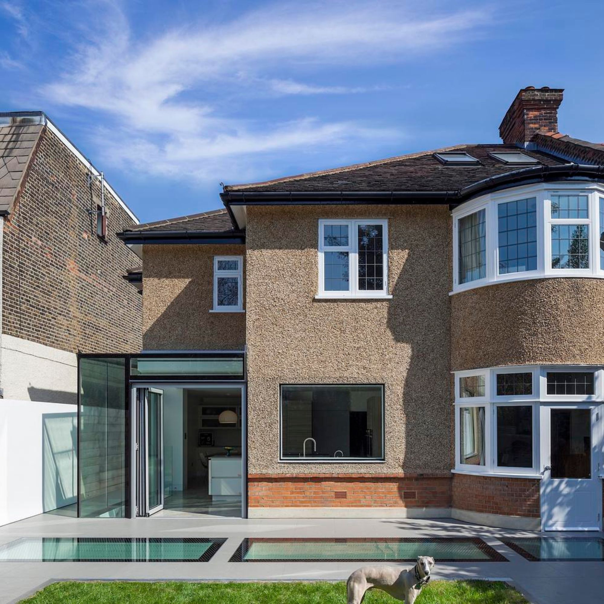 Exterior of extended property with hipped roof