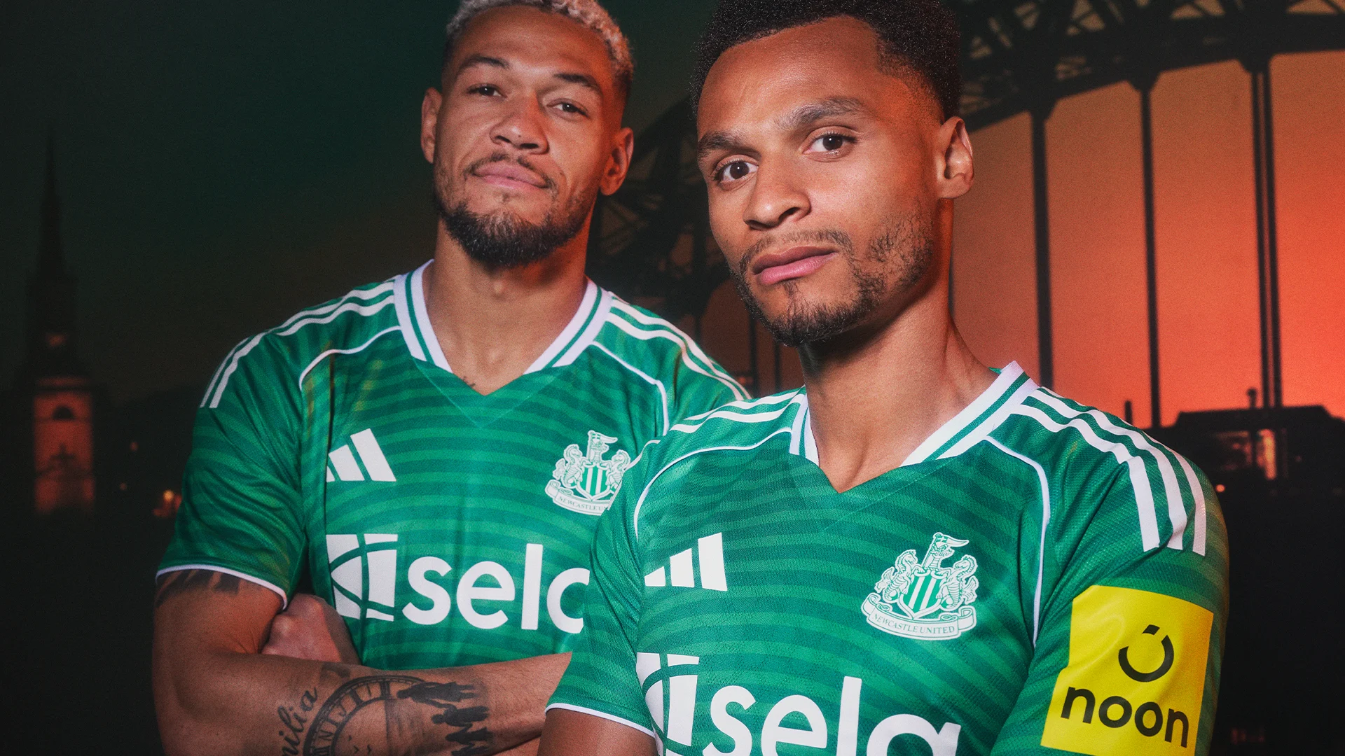 Joelinton (L) and Jacob Murphy (R) model the new 2025-26 Newcastle United away kit