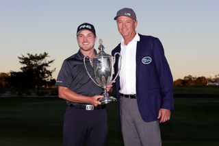 Austin Cook (left) and Davis Love III with the 2017 RSM Classic trophy