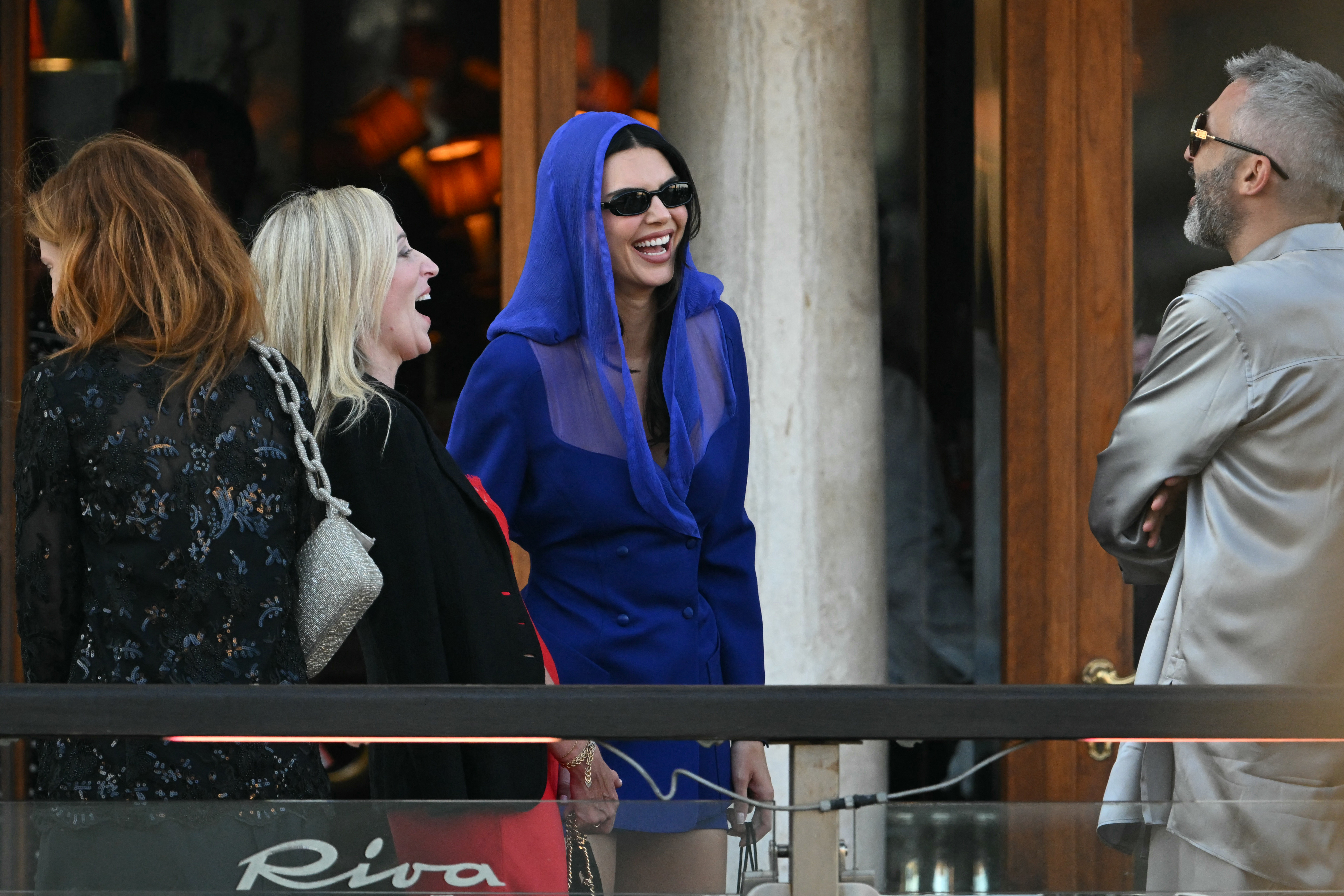 Kendall Jenner wears a simple vest top and vintage Mugler during the Bezos-Sanchez Venice wedding weekend
